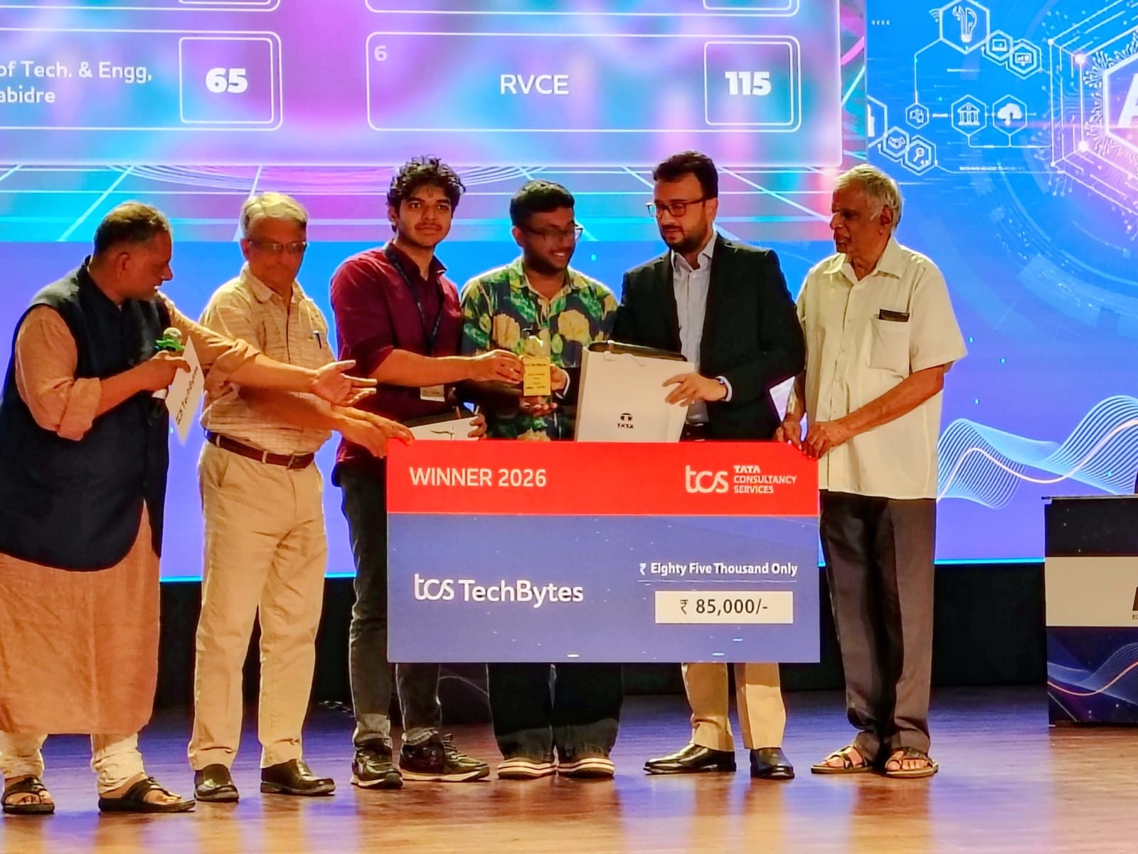 Winners - RV College of Engineering Aaditya S Rao, Shashank Shenoy B being presented the trophy by Prof. S. Sadagopan, Prof Gopal Hedge from IISC and Mr. Giri from Grey caps . Heartiest congratulations ! These two witty young minds were super fast at the buzzer round and also strategized their answers